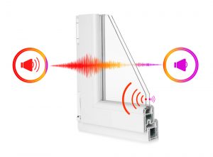 This image demonstrates the function of a noise reduction window. A pane of glass is shown, with a loud sound wave on the left side and a quieter one on the right.