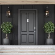 Front of a home that is showcasing a front door.